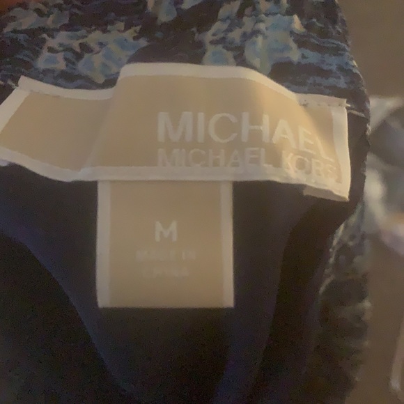 Michael Kors blue  floral skirt.  Synched waist can fit a large. Never warn. - Picture 2 of 2